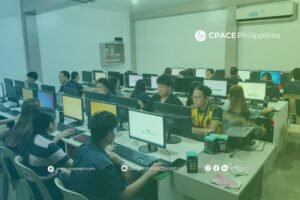 Training room with rows of desktop computers, participants engaged in CPACE Philippines session.