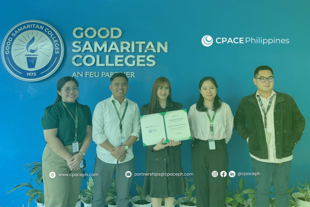 Five people stand before a blue wall with the logos of Good Samaritan Colleges and CPACE Philippines. The center person holds a certificate, marking a partnership event.