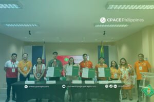 Group of representatives at CPACE–CVSU partnership signing, holding documents in a formal ceremony.